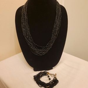 Necklace, earrings, and bracelet